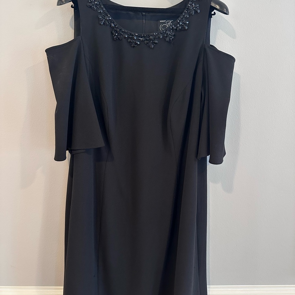 Elegant Black Dress with Embellished Neckline